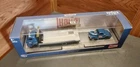 Dodge L600 1970 Flatbed Truck Military Blue con 1941 Willys Coupe Gasser Military Blue "Holley Carburetor Co" - Imagen 5