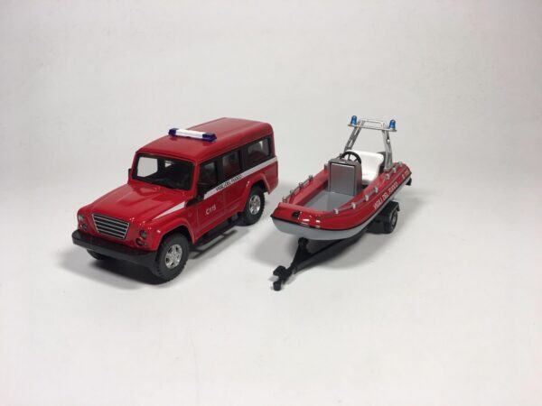 Land Rover Defender Bomberos Italia con lancha (solo caja dañada) 1:43